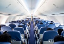 Waarom zijn vliegtuigstoelen blauw (en vliegtuigen wit)? Waarom zijn vliegtuigstoelen blauw en vliegtuigen wit